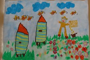 praca plastyczna rysowana pastelami- dwa ule, pszczoły, pszczelarz